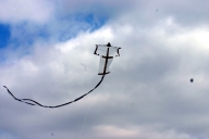 A sode kite flying with its tail